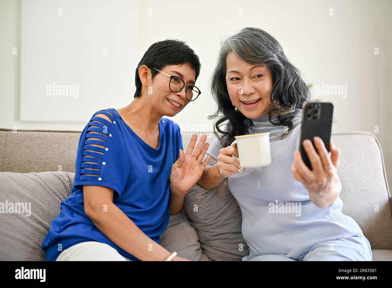 Two old women talking tea hi-res stock photography and images - Alamy