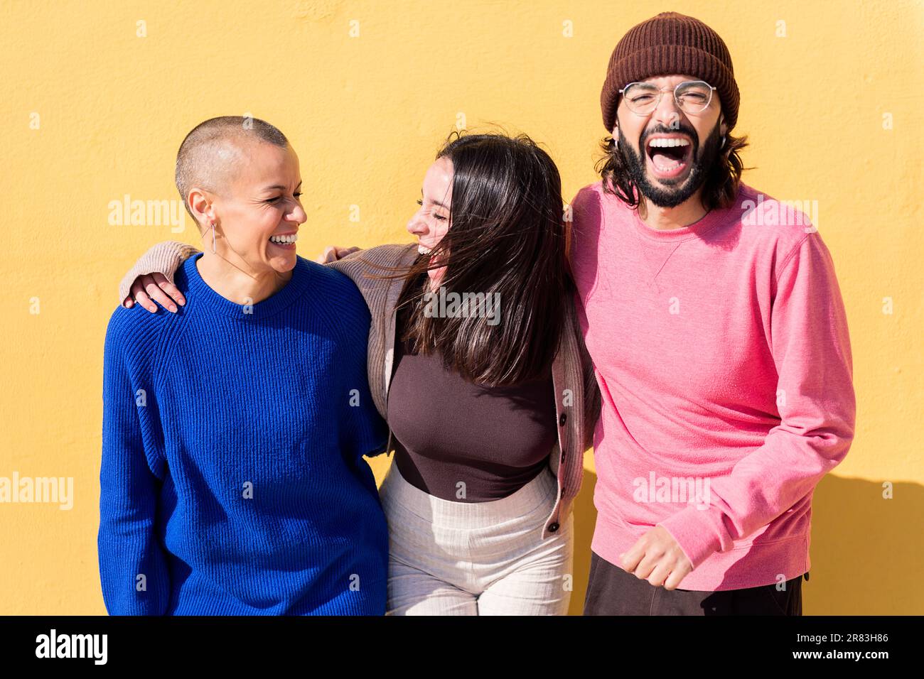 young friends laughing and having fun together Stock Photo