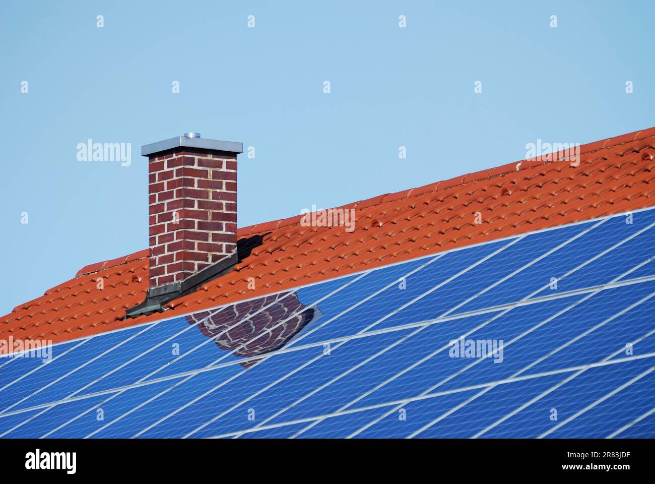 Tiled roof with photovoltaic cells Stock Photo