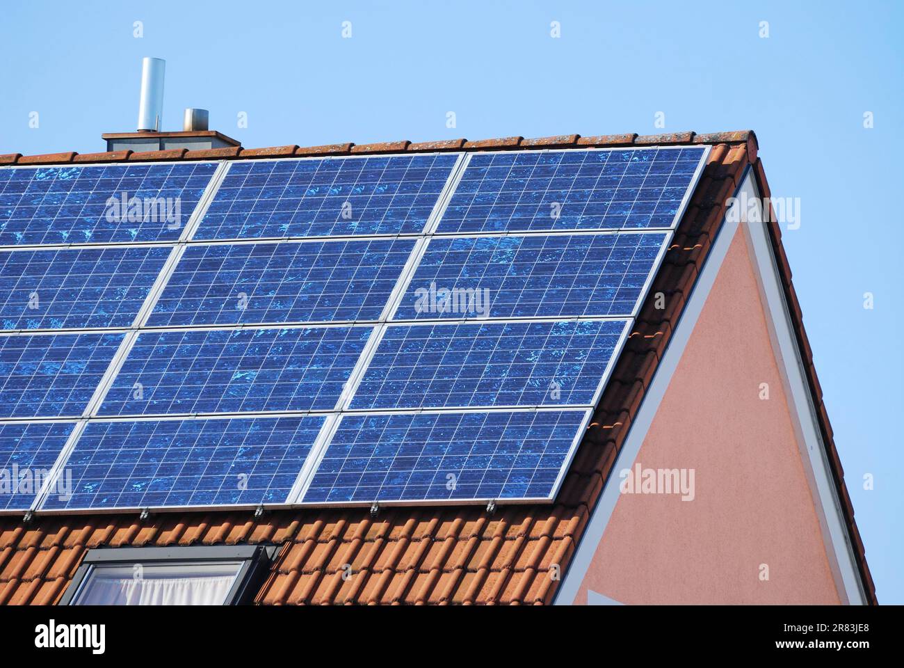 Generation of renewable energy on the roof. of a house Stock Photo