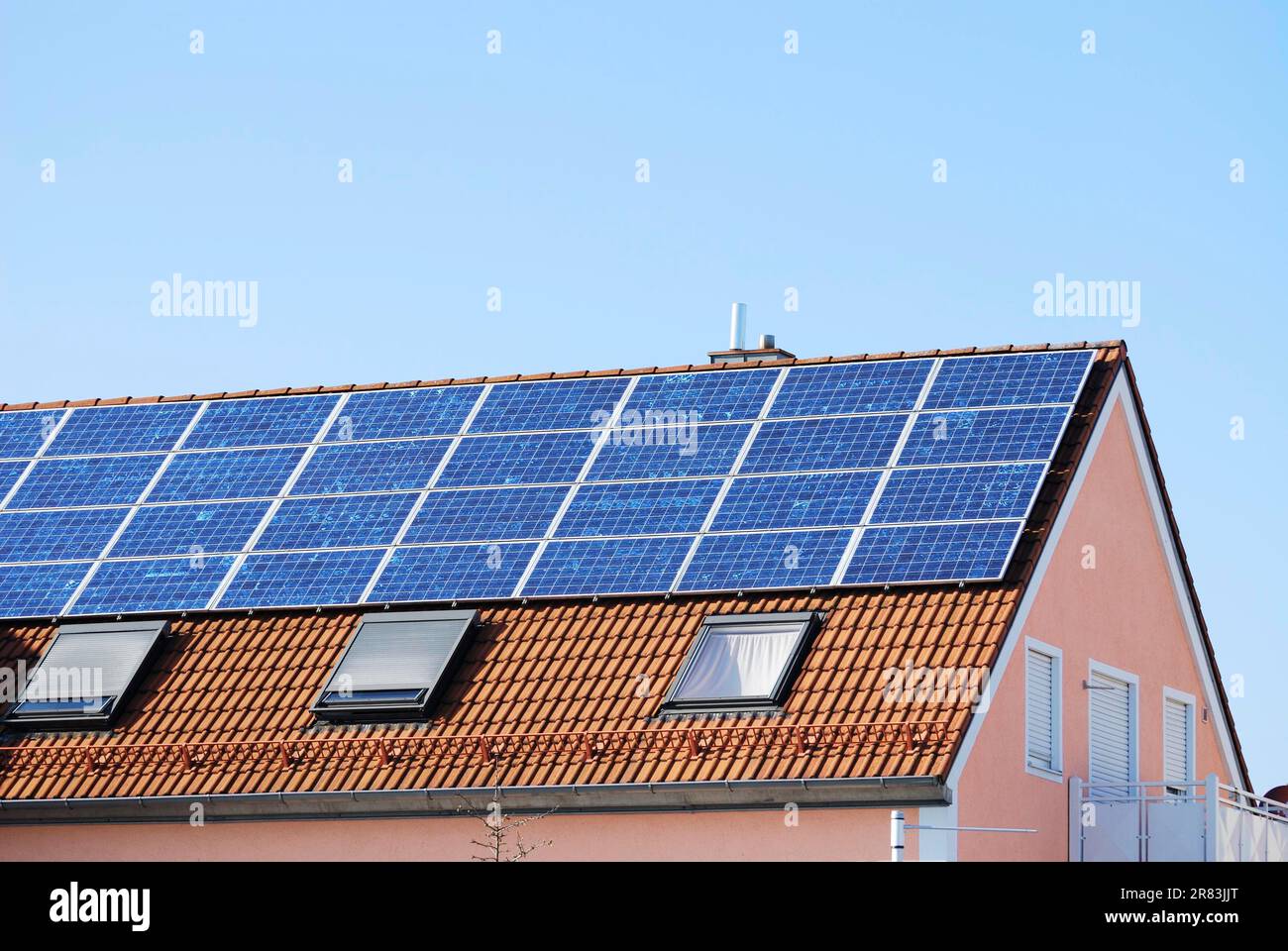 House roof covered with solar panels Stock Photo
