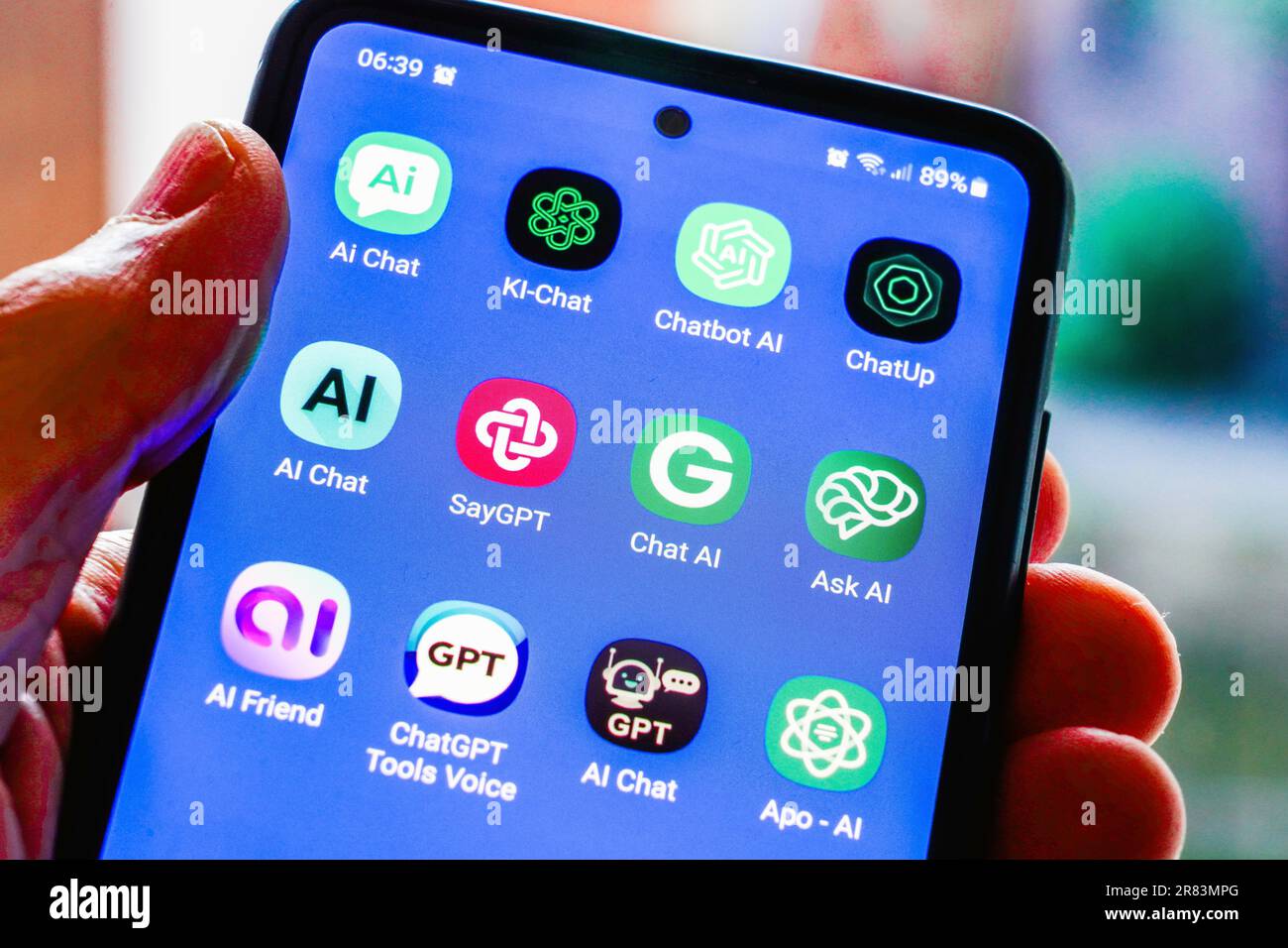 The logos of various ChatGPT artificial intelligence (AI) apps on german a smartphone screen Stock Photo