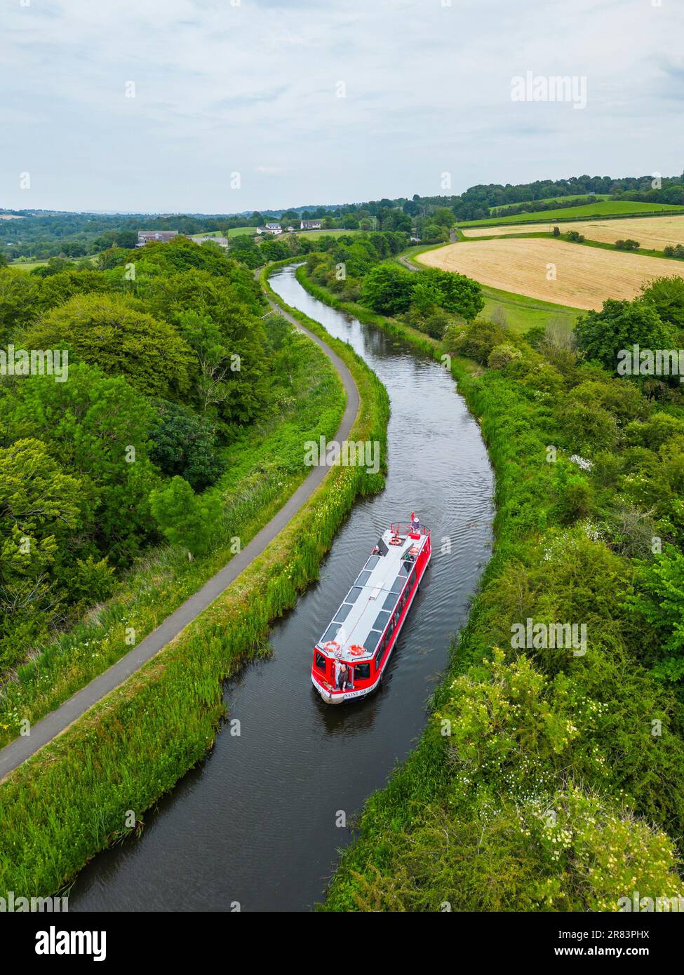 An aerial view of a narrow boat on the Union Canal near Linlithgow, Scotland. Stock Photo