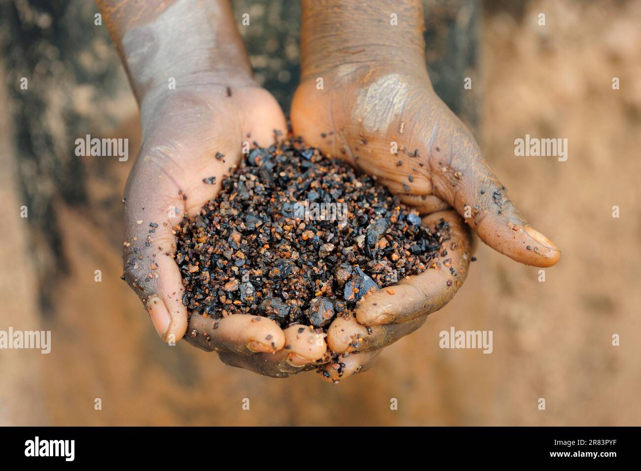 Coltan metal ore, open pit coltan mining, Muhanga coltan mines, Rwanda Stock Photo