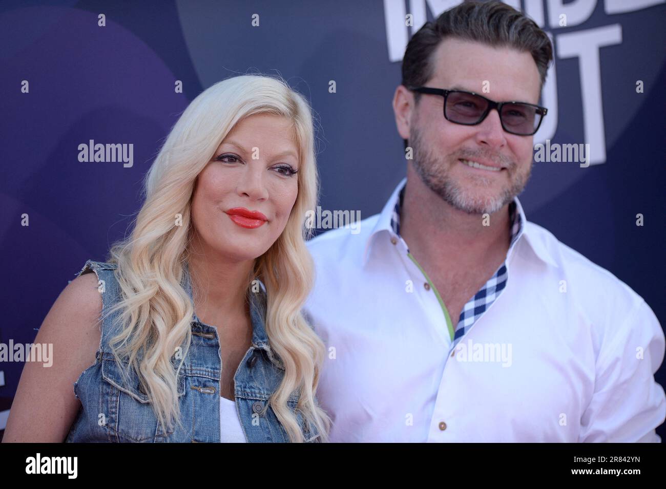 Los Angeles, United States. 19th June, 2023. File photo dated June 8, 2015 of Tori Spelling and Dean McDermott attend the Los Angeles premiere of Disney-Pixars Inside Out at the El Capitan Theatre in Los Angeles, CA, USA. - Tori Spelling and husband Dean McDermott announce split after 18 years and vow to 'work together as loving parents' for their five children. Photo by Lionel Hahn/ABACAPRESS.COM Credit: Abaca Press/Alamy Live News Stock Photo