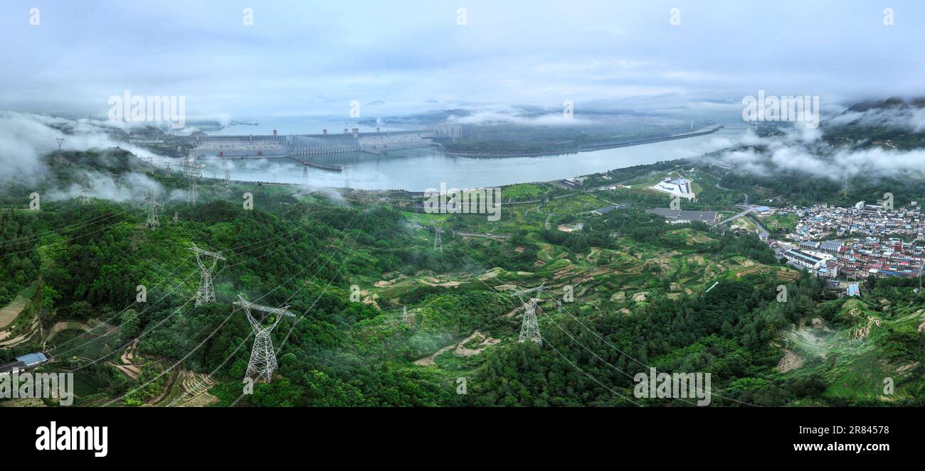 Aerial photo shows the Three Gorges Dam power station and transmission lines in Yichang, Hubei province, China, June 19, 2023. On the same day, Group Stock Photo