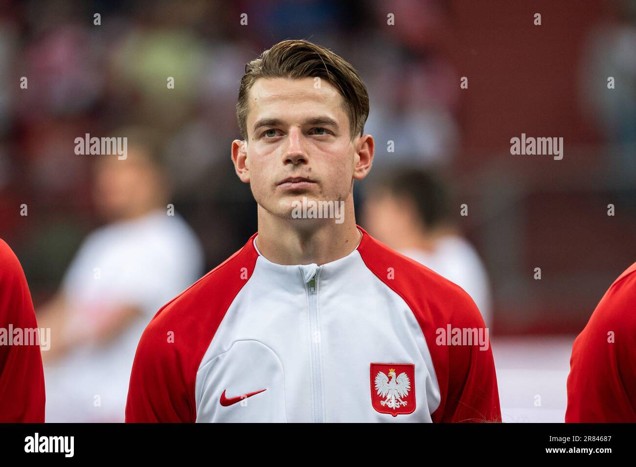 Jeremie FRIMPONG (Bayer 04 Leverkusen, #30) in a duel with Jakub KAMINSKI  (VfL Wolfsburg, #16), Stock Photo, Picture And Rights Managed Image. Pic.  PAH-321123917