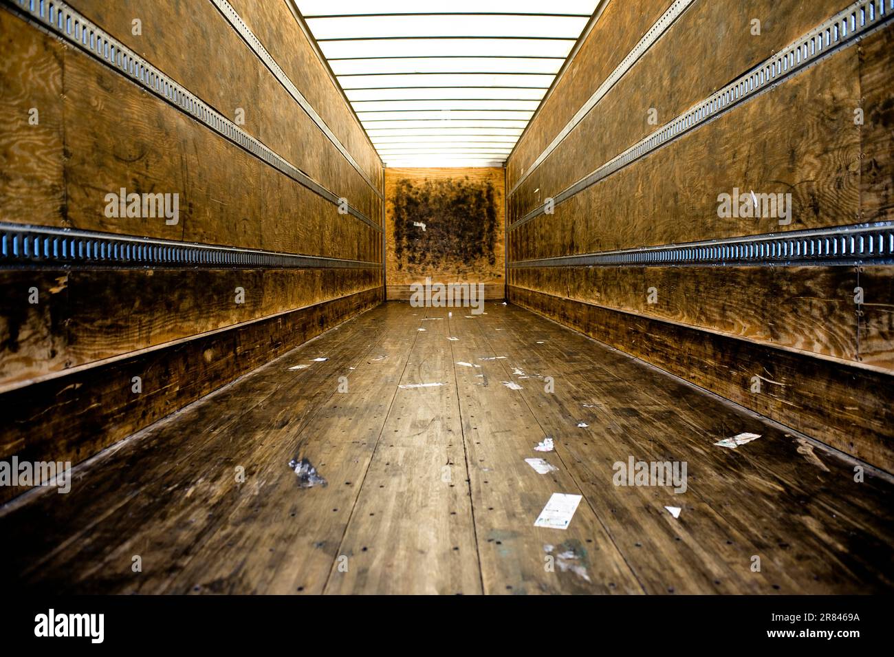 The empty trailer that hauls tires shows the black rubber marks of