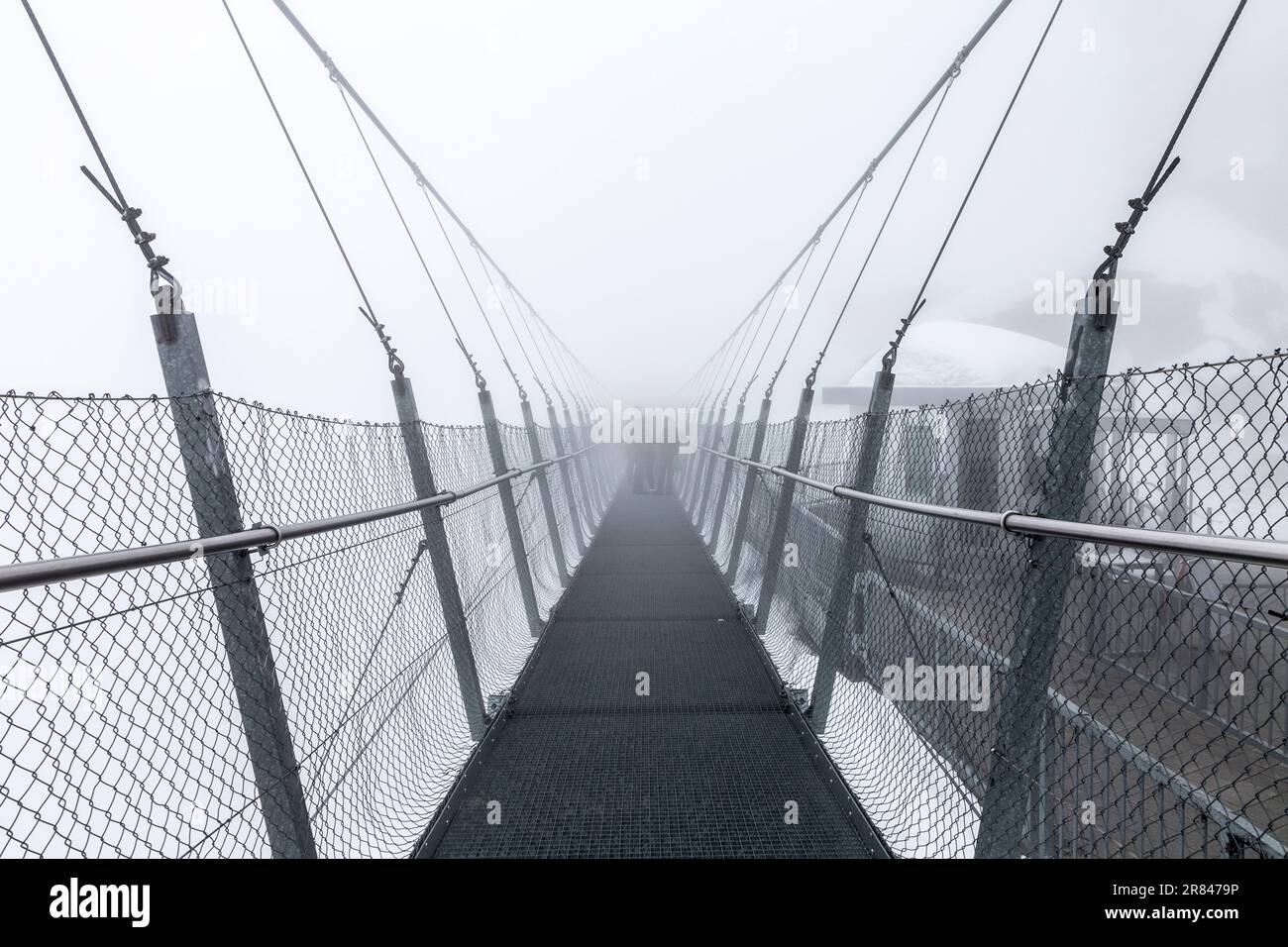 Titlis Cliff Walk on a foggy, overcast day, Mount Titlis, Switzerland Stock Photo