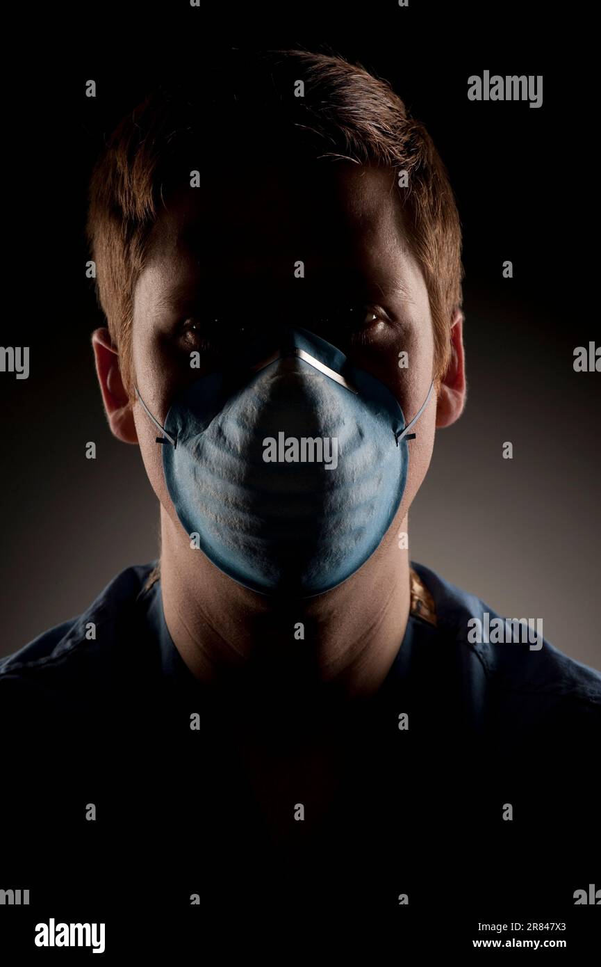Studio portrait of a 24 years old Caucasian man wearing a protective ...