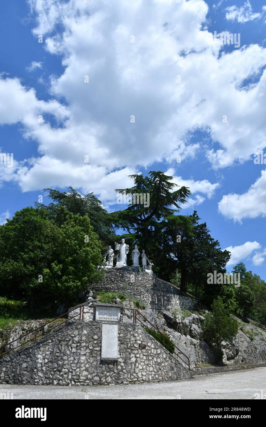 Statues at the entrance to the monastery avenue in Subiaco, a medieval town near Rome in Italy. Stock Photo