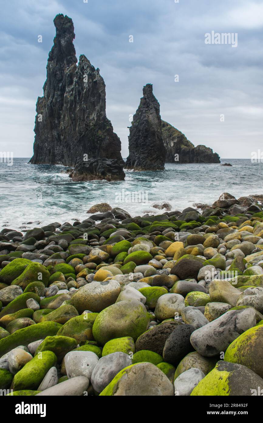 beach with colorful rocks and cliffs in the sea Stock Photo - Alamy