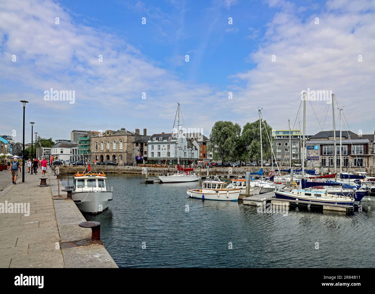 Plymouth Sutton Harbour, inner basin, yachts at rest in a safe haven. The historic Custom House