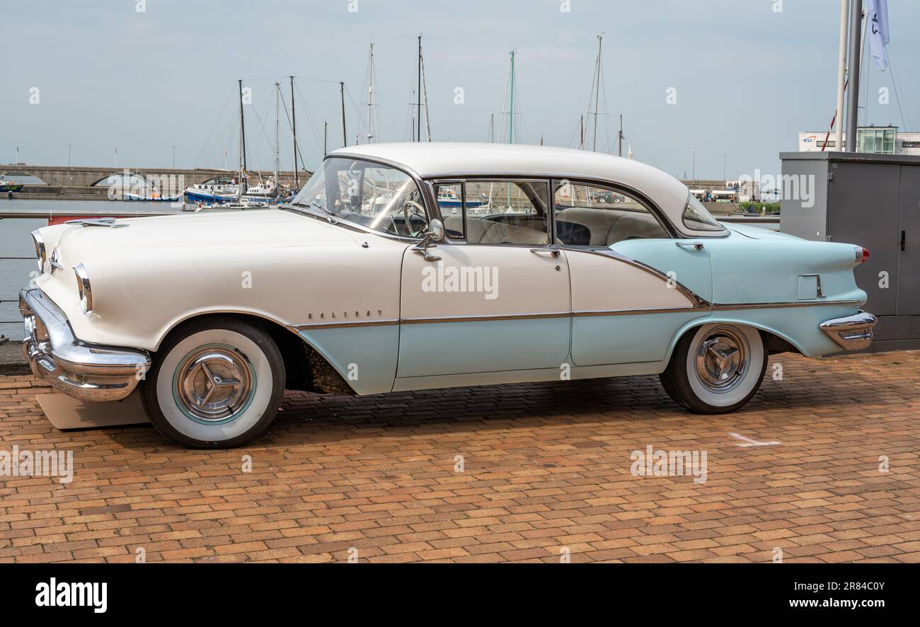 Lelystad, The Netherlands, 18.06.2023, Side view of vintage car Oldsmobile 88 Holiday from 1956 at The National Oldtimer Day Stock Photo