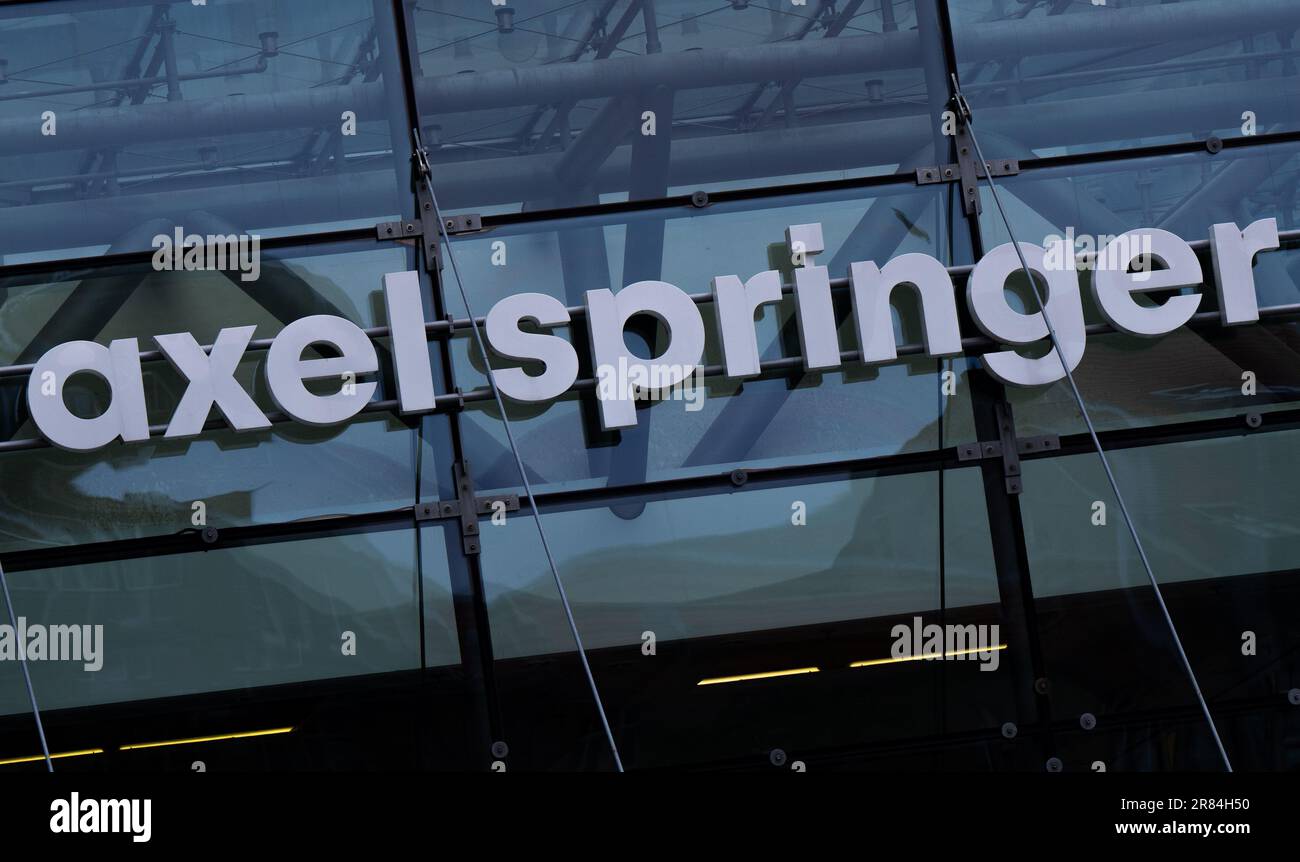 Berlin, Germany. 19th June, 2023. The Axel Springer Verlag logo is displayed above the entrance to the publishing building. The Axel Springer publishing house wants to push ahead with its savings course at the 'Bild' newspaper with leaner regional structures. Credit: Monika Skolimowska/dpa/Alamy Live News Stock Photo