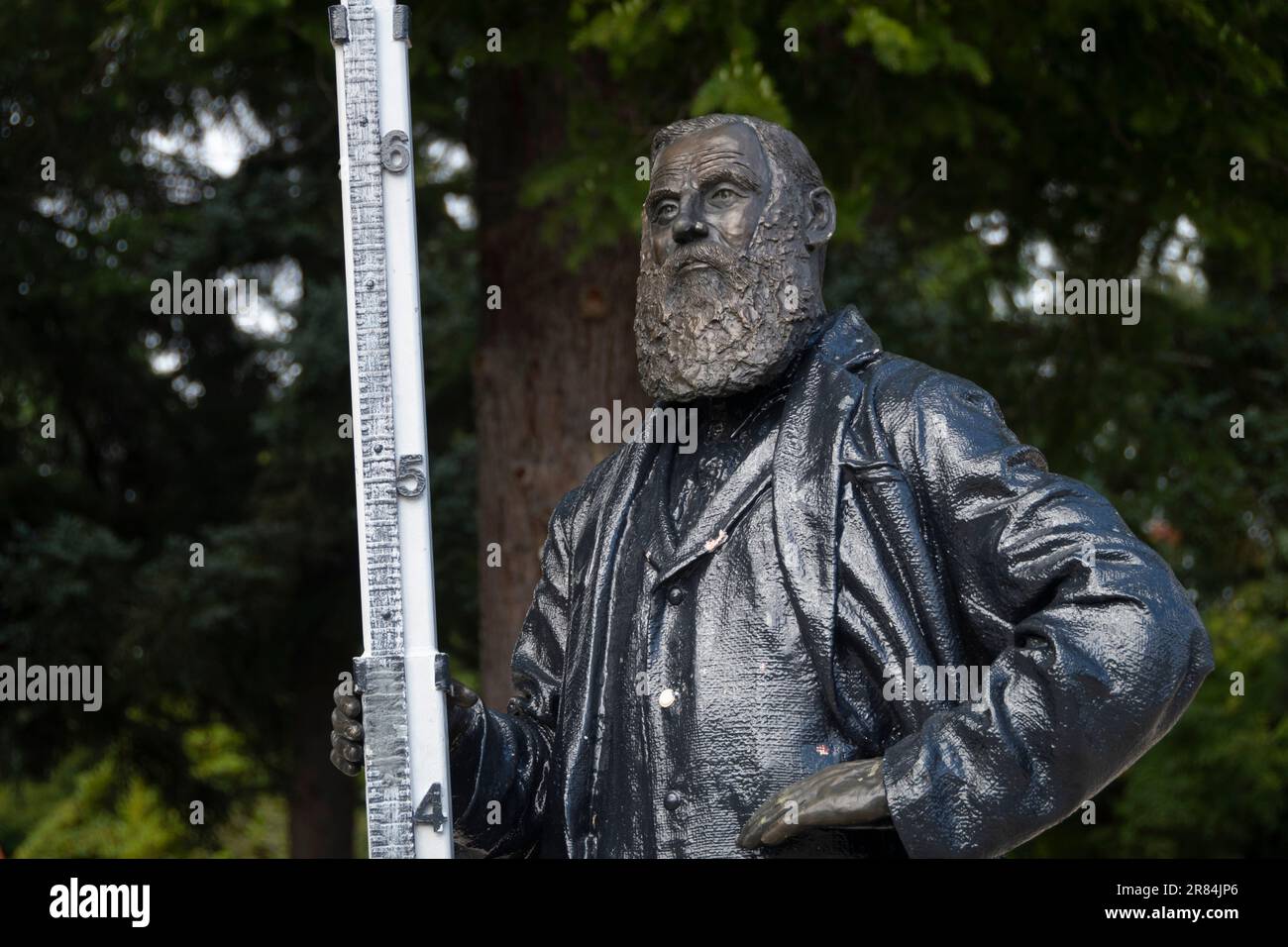 Statue of land surveyor, Hanmer Springs, Canterbury, South Island, New Zealand Stock Photo