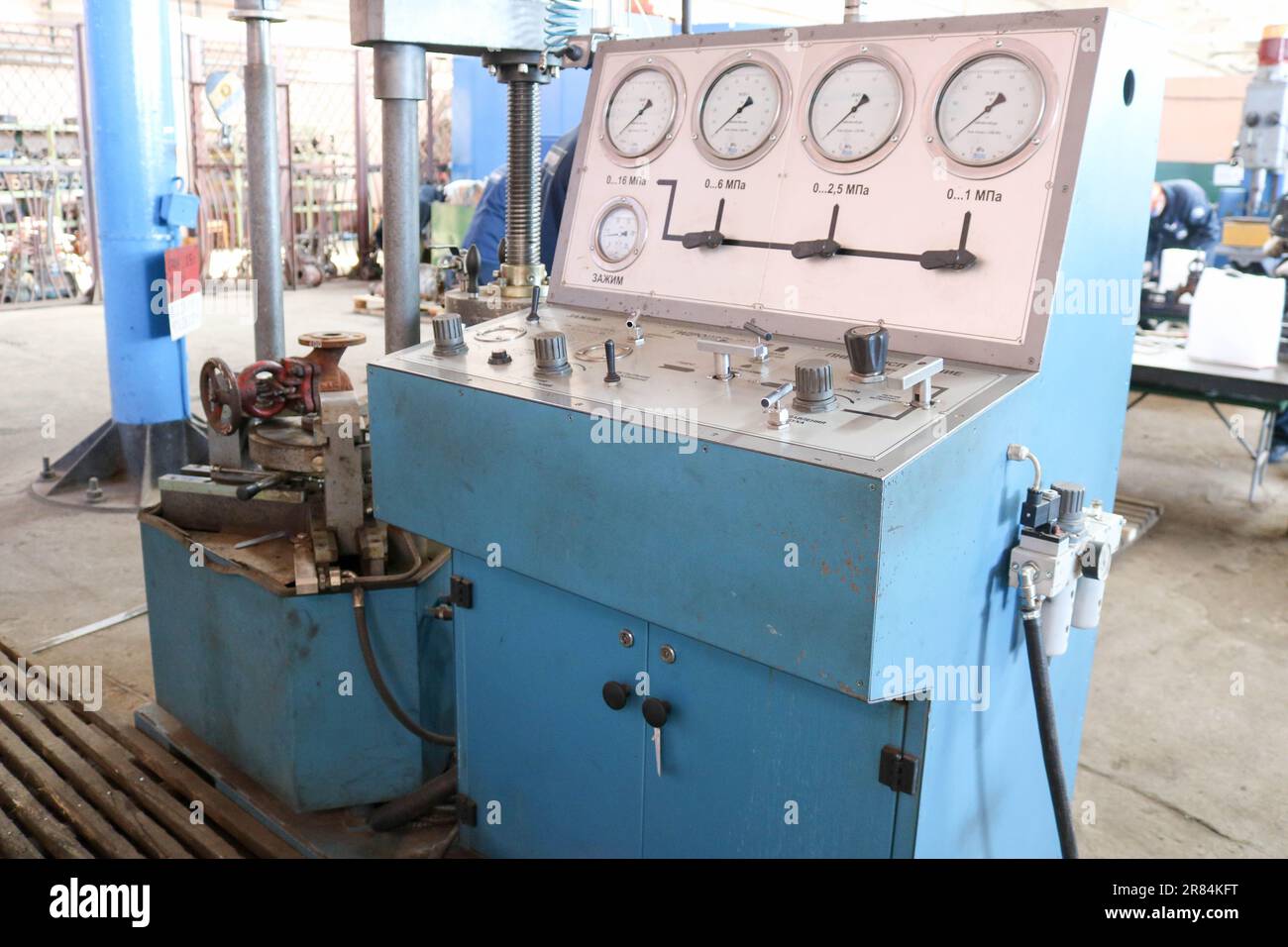 Large blue stand for hydrotesting bolt, pipeline fittings, pressure gauges, leak testing, pressure. Stock Photo