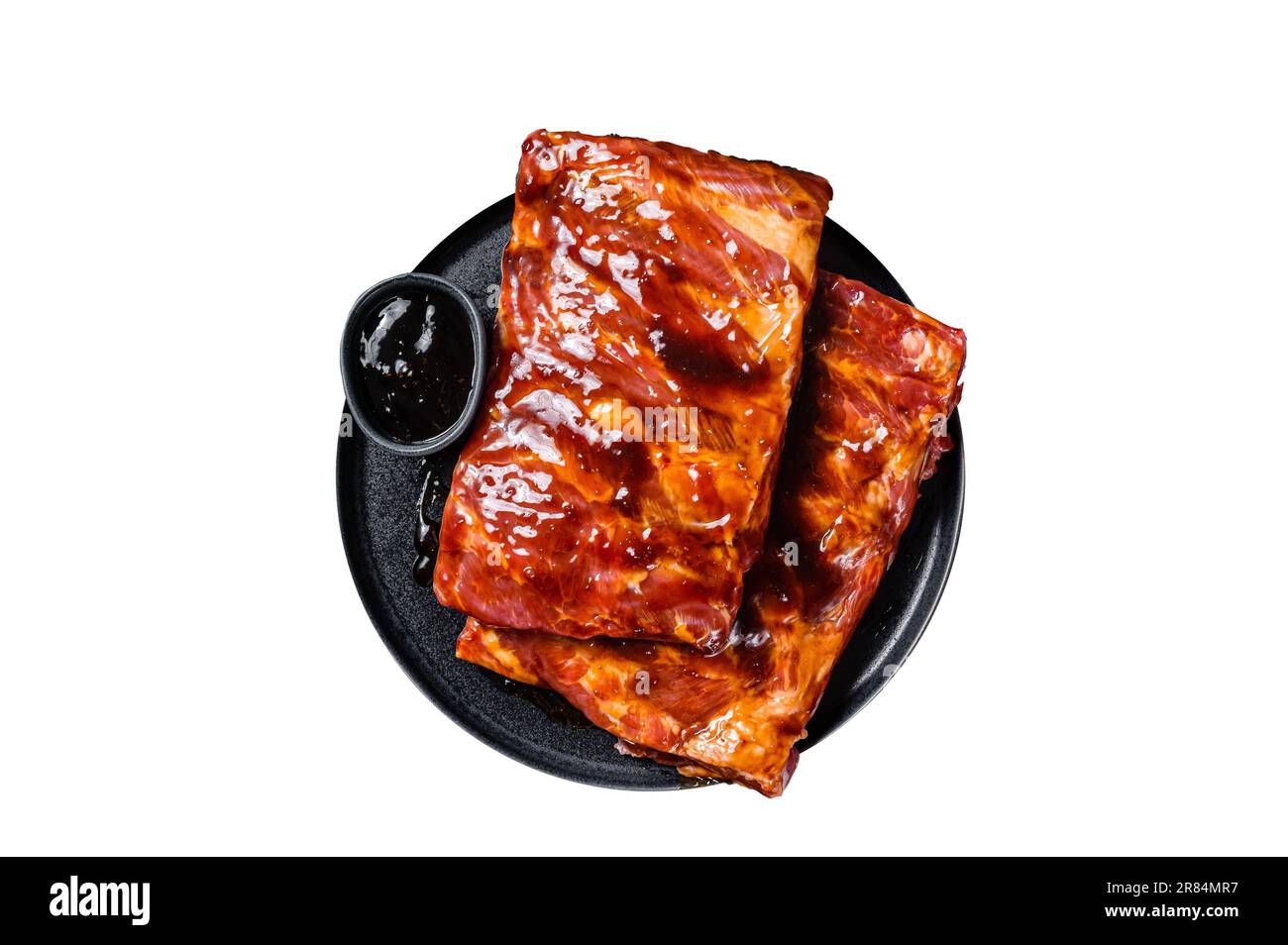 Ready for BBQ raw pork spare ribs with barbecue sauce. Isolated on