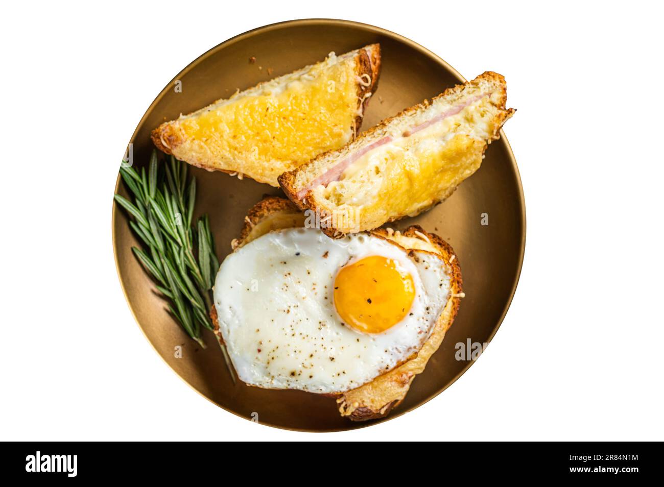 Croque monsieur and croque madame sandwiches with sliced ham, melted emmental cheese and egg, French toasts. Isolated on white background Stock Photo