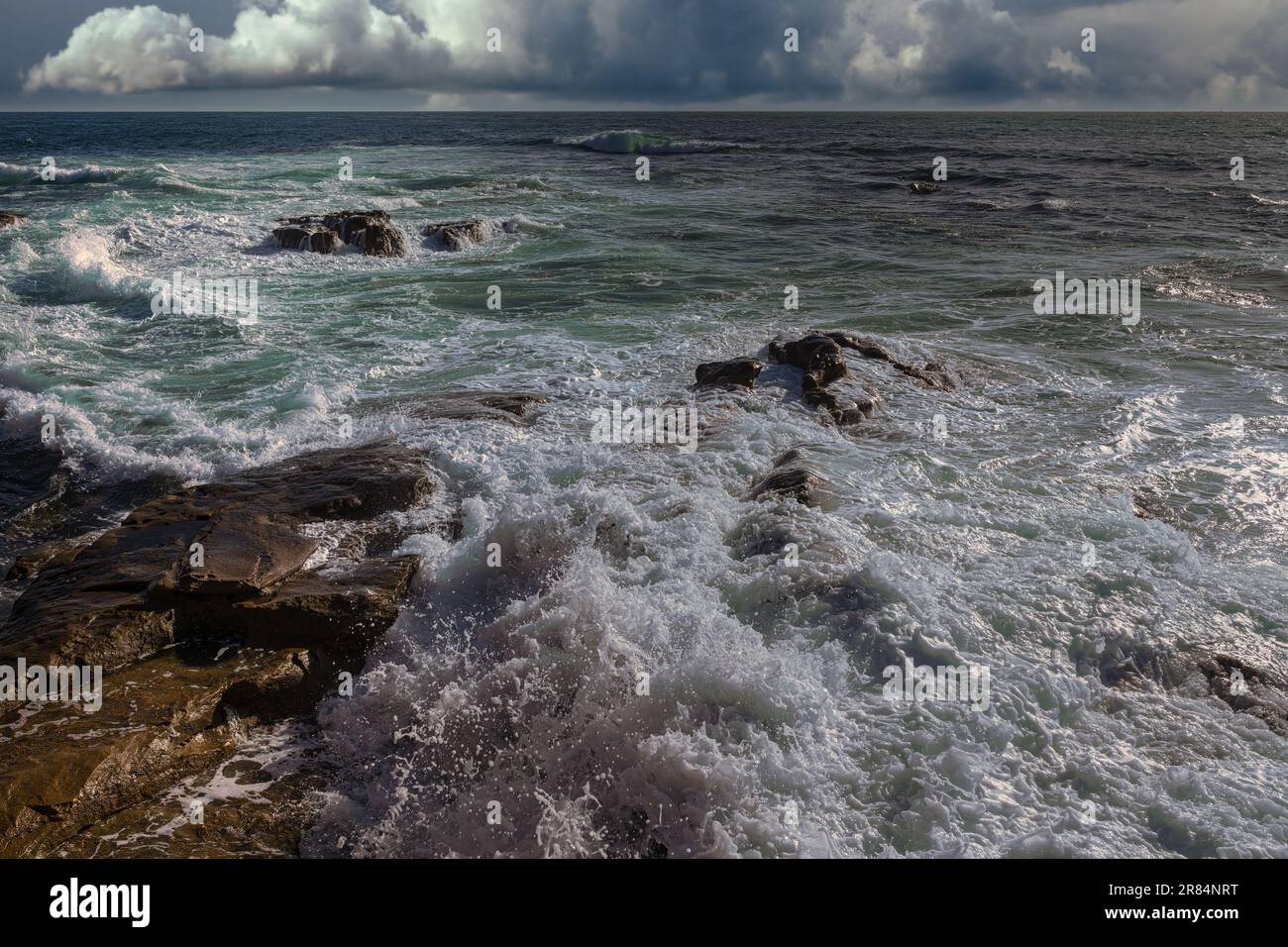 A view of sea waves breaking beach Stock Photo