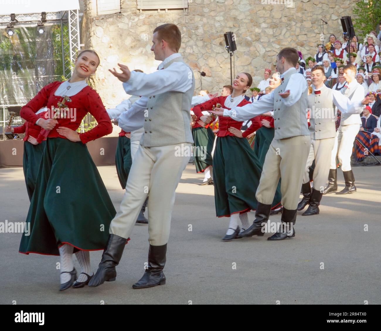 Dobele, Latvia - May 27, 2023. Joyfully young dancers of the folk dance