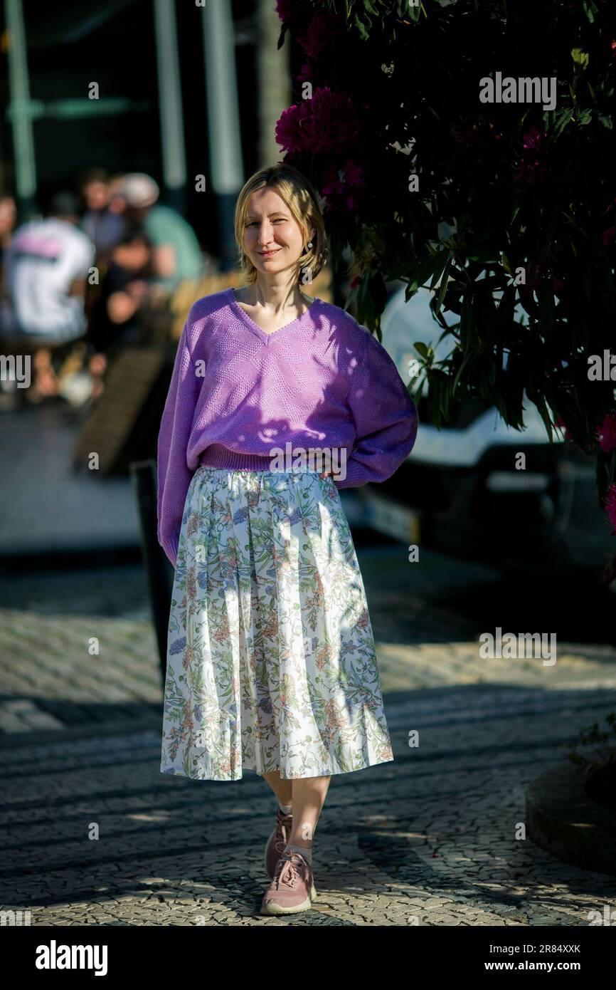Old woman walks in shade hi-res stock photography and images - Alamy