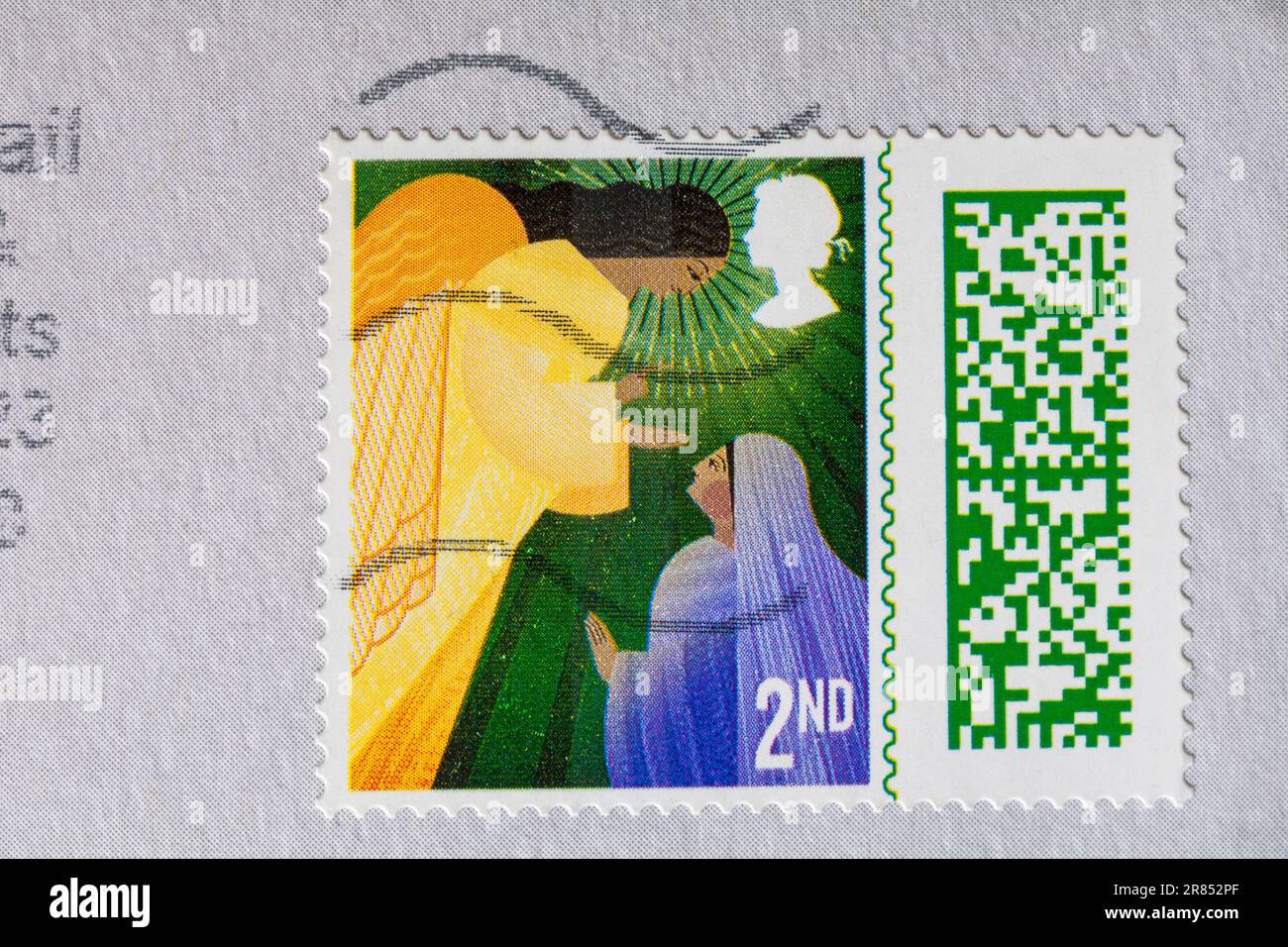 2nd class Christmas stamp stuck on envelope stamp barcoded, stamp