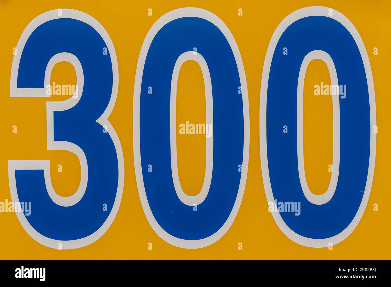 300 foot ft baseball field distance sign in yellow and blue mounted on