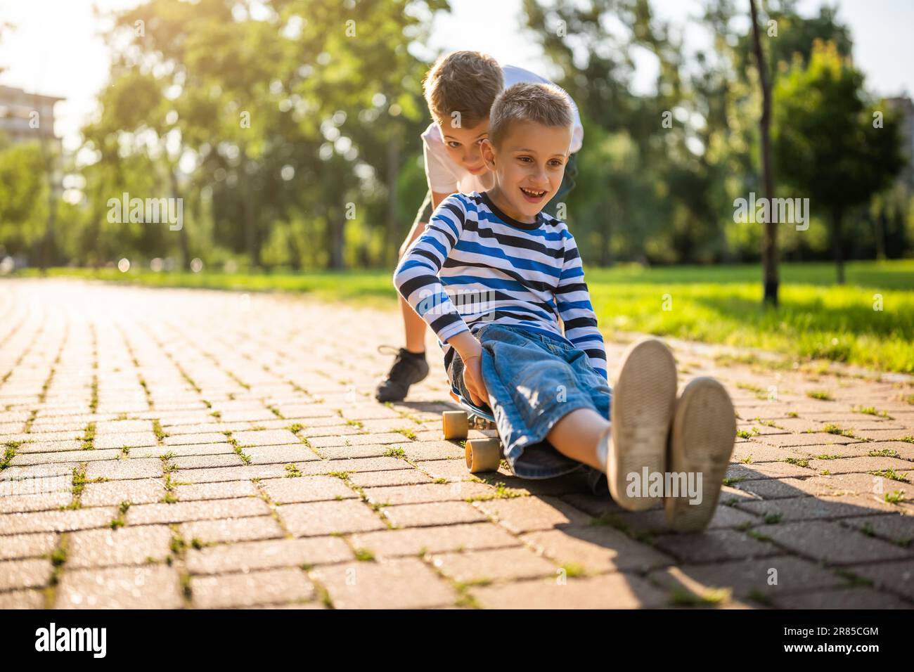 Children playing outdoor park hi-res stock photography and images - Alamy