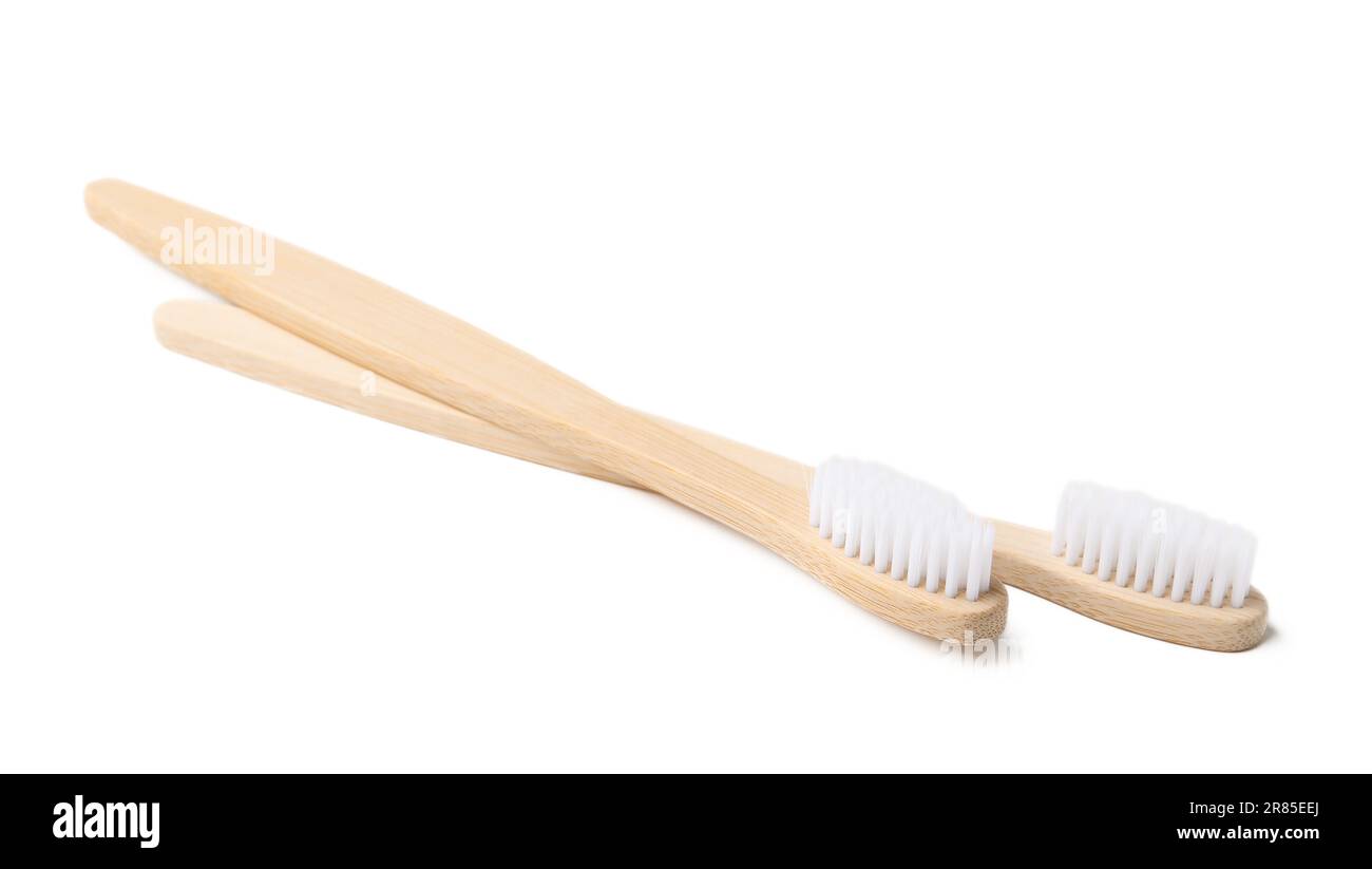 Bamboo toothbrushes on white background Stock Photo - Alamy