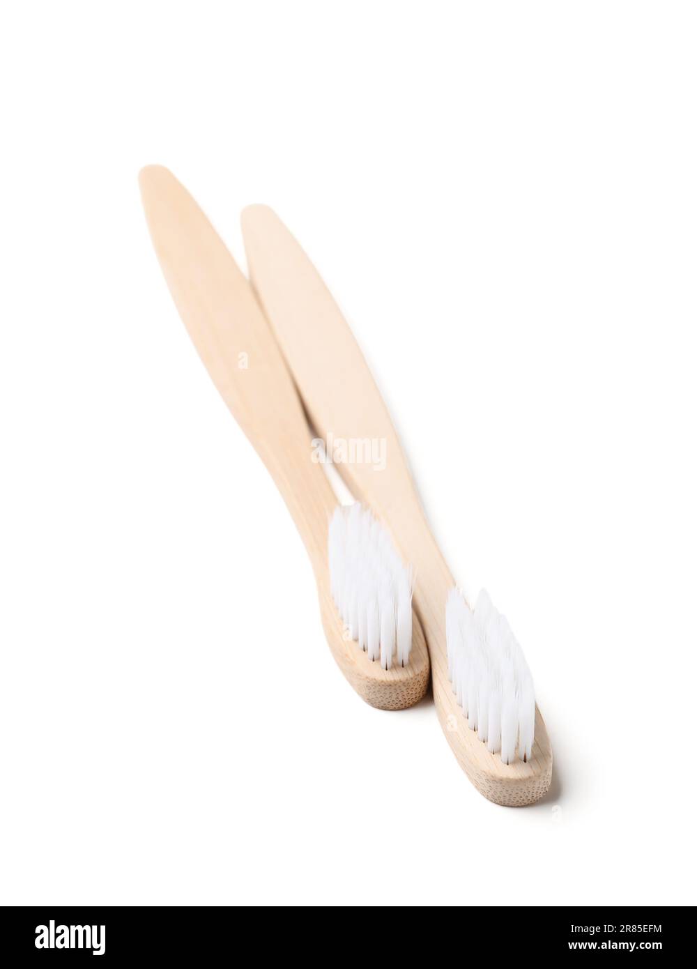 Bamboo toothbrushes on white background Stock Photo - Alamy