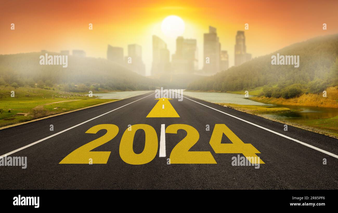 Year 2024 Written On Flat Asphalt Road Empty Road To City And Sunrise Over Skyscrapers 2024 New Year Goals 2R85PF6 
