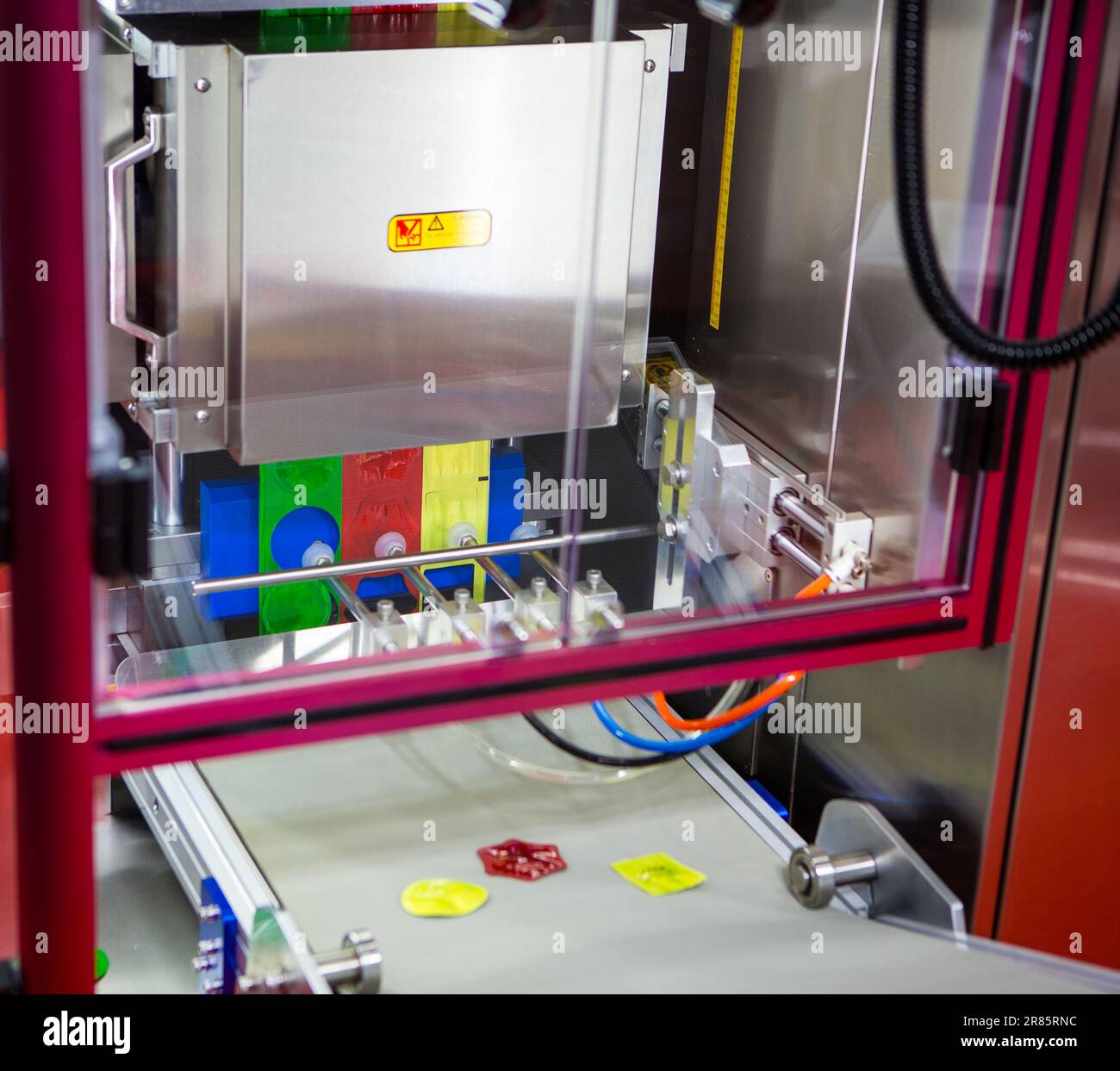 Sauce sachet automatic vertical filling and machine Stock Photo Alamy