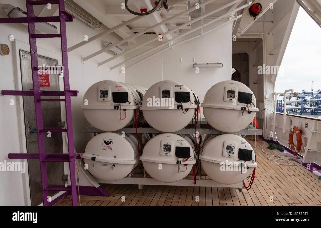 Belfast, United Kingdom. June 2023. Life saving equipment shaped like barrels for emergency use only on deck of a ship. Stock Photo
