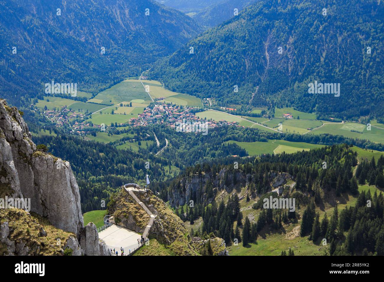 View from the summit of the Wendelstein Mountain to Bayrischzell and a look out - Bavaria, Germany Stock Photo