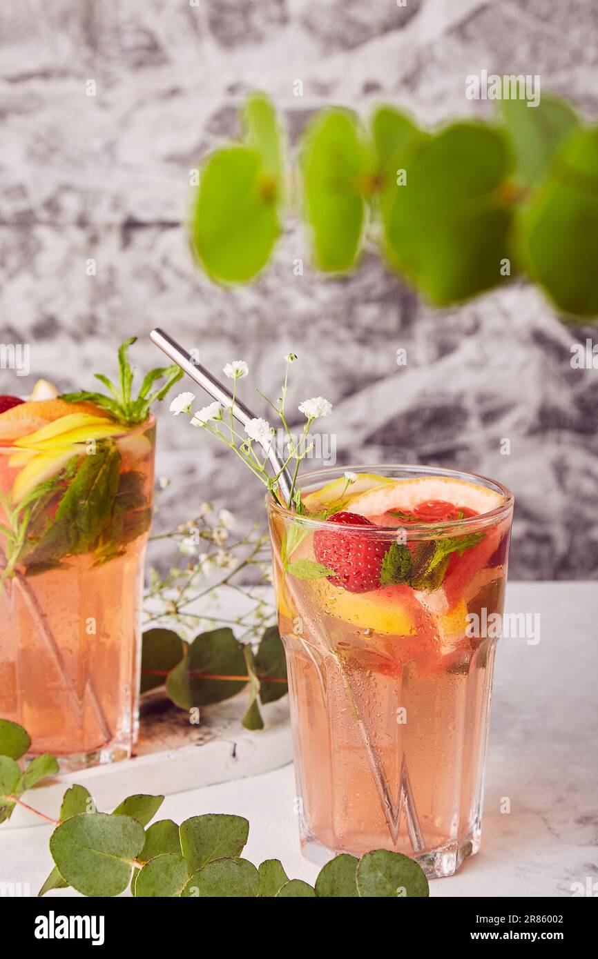 Non alcoholic refreshing summer mocktails with citrus, Grapefruit mocktail. Detox cold cocktails. Stock Photo