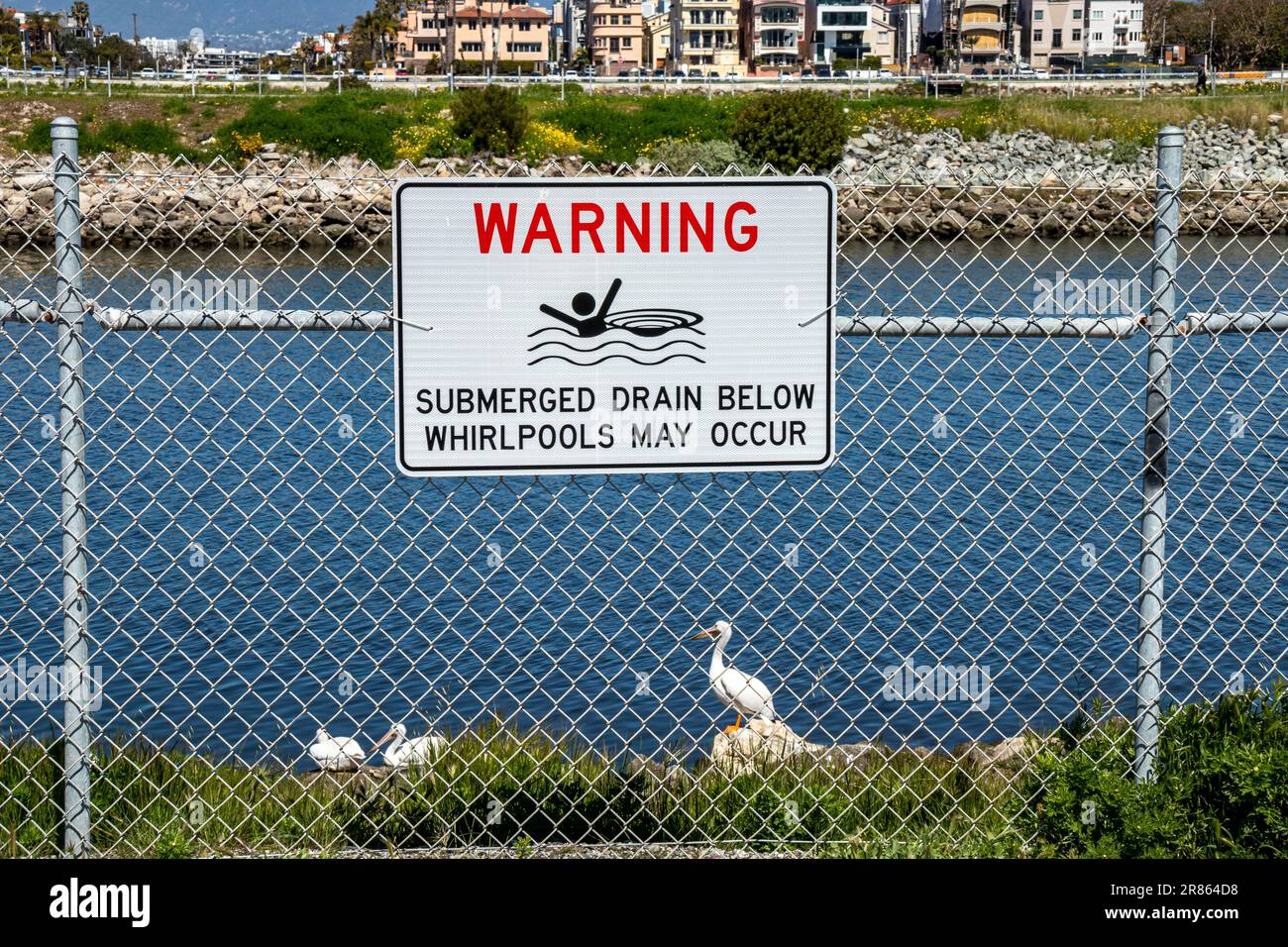 Warning sign in Ballona Creek, Marina Del Rey, Los Angeles, California, USA Stock Photo