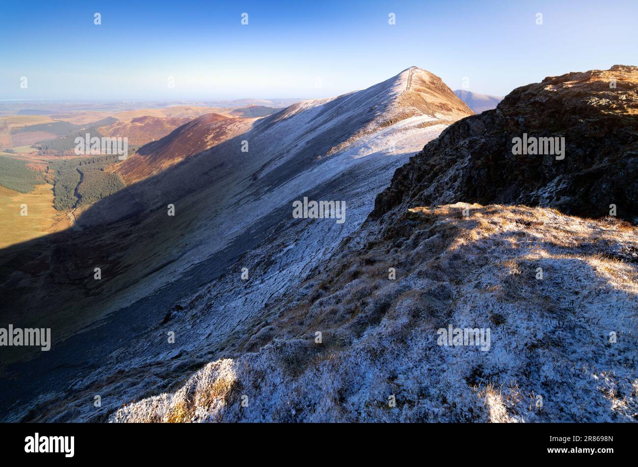 Views along the ridge to Grisedale Pike and Hobcarton End in winter in the English Lake District, UK. Stock Photo