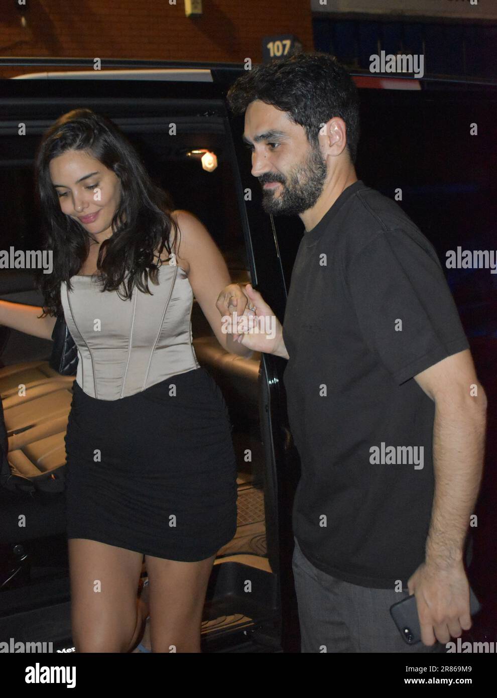 Manchester. UK. Manchester City football player Ilkay Gundogan and wife ...