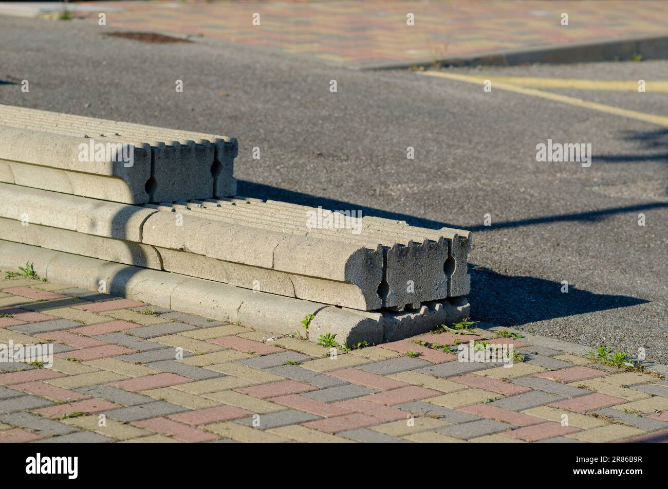 dry stone walls, construction detail of prefabricated walls in gravity concrete blocks, retaining wall in concrete blocks. Stock Photo