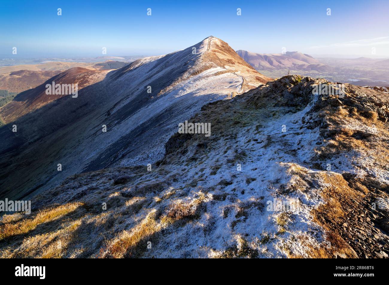 Views along the ridge to Grisedale Pike and Hobcarton End in winter in the English Lake District, UK. Stock Photo