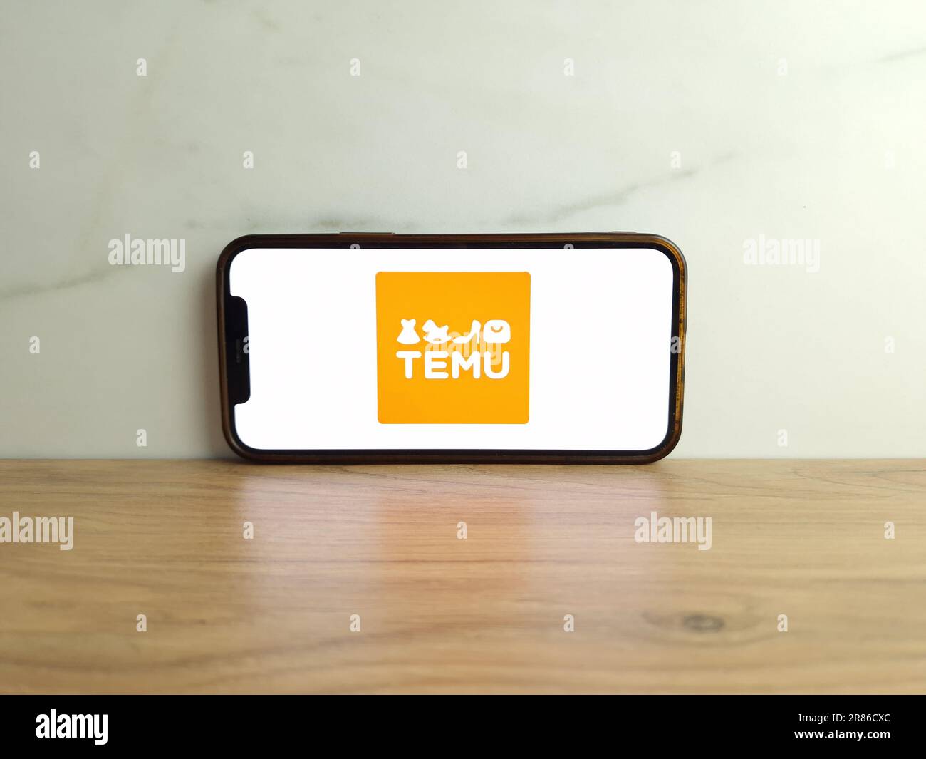 Konskie, Poland - June 17, 2023: Temu online marketplace logo displayed on mobile phone screen Stock Photo