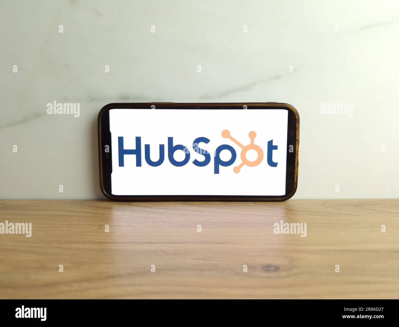 Konskie, Poland - June 17, 2023: HubSpot software company logo displayed on mobile phone screen Stock Photo