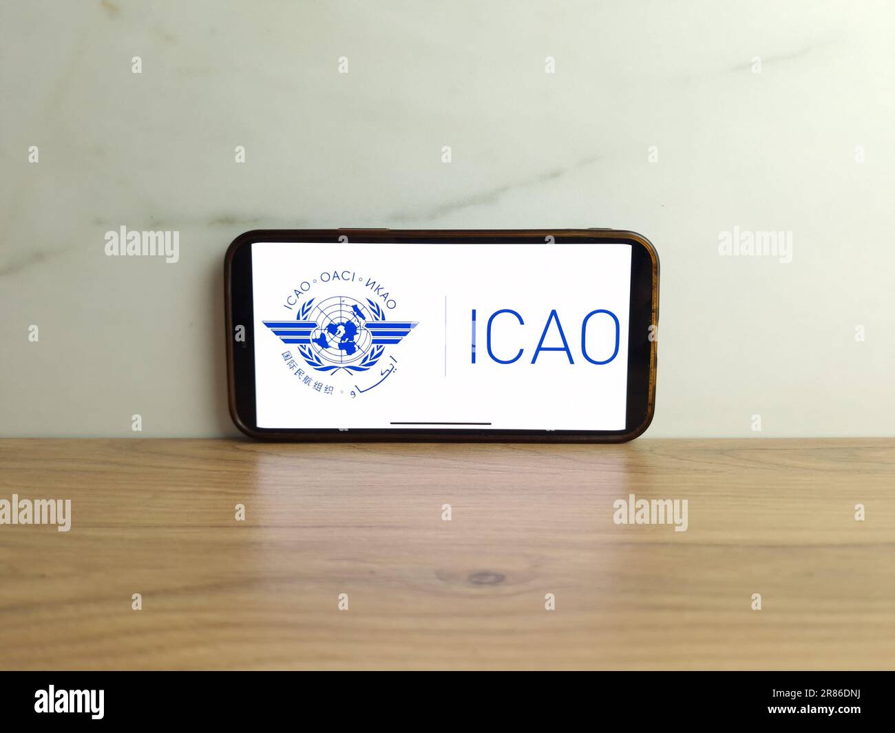 Konskie, Poland - June 17, 2023: ICAO International Civil Aviation Organization logo displayed on mobile phone screen Stock Photo