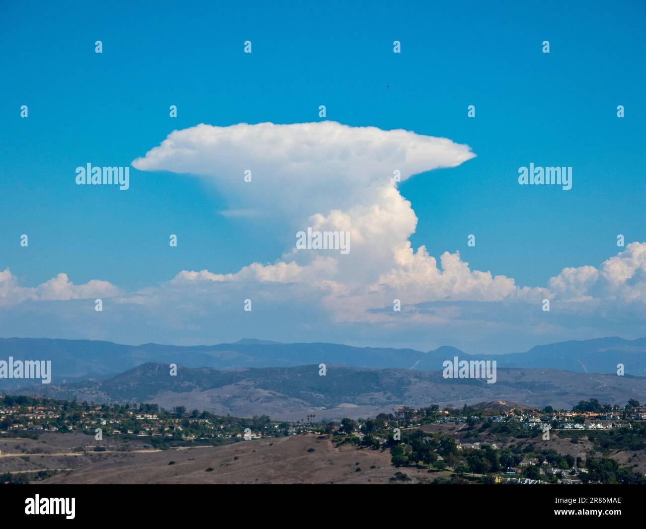 Cumulonimbus (from Latin cumulus 'heaped', and nimbus 'rainstorm') is a