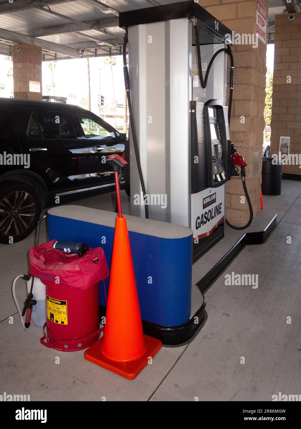 A Southern California suburban mall gas station includes fighting