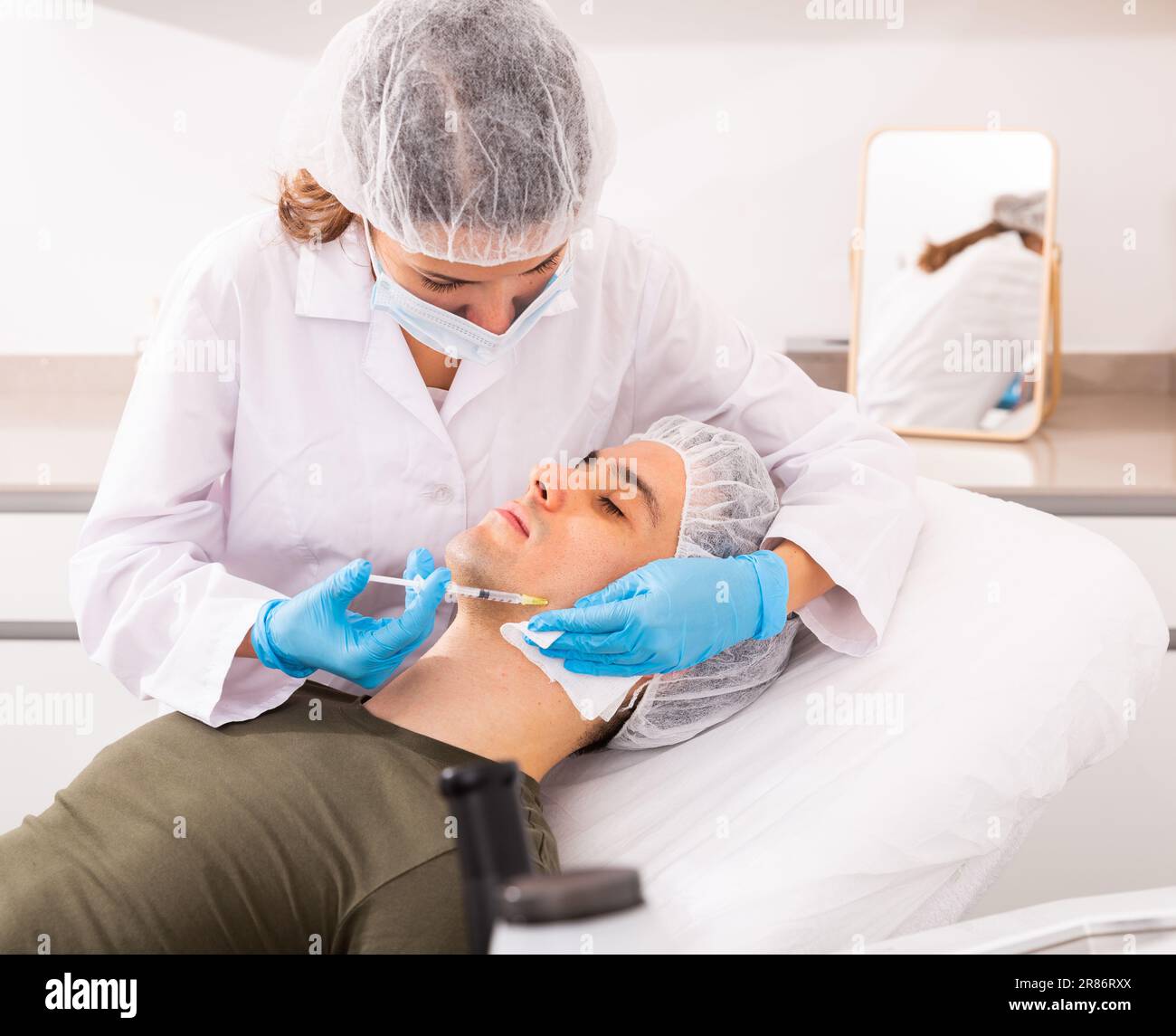 Person Getting Face Injection Clientclient hi-res stock photography and images - Alamy