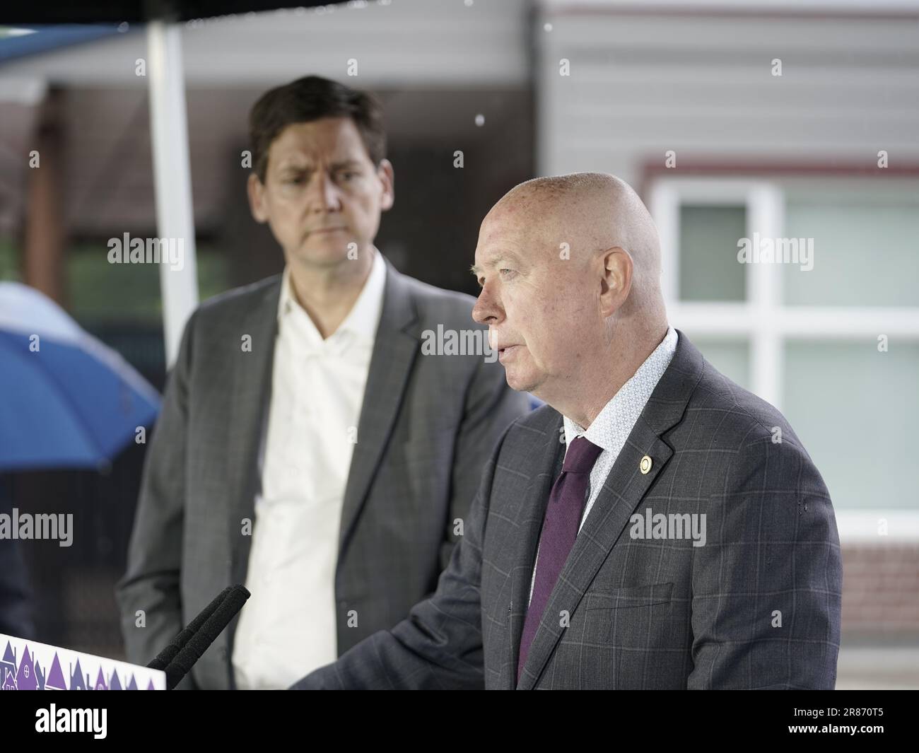 Burnaby, Canada. 19th June, 2023. June 19, 2023. BC Premiere David Eby looks on as Burnaby Mayor
