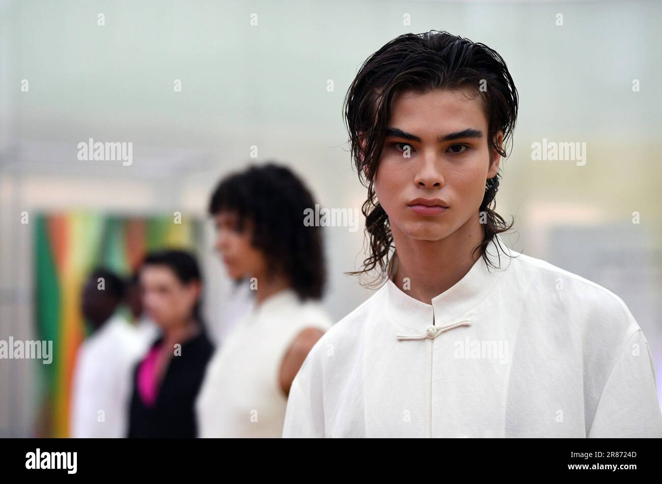 Milan, Italy. 19th June, 2023. A model presents a creation of SHANGHAI TANG Spring/Summer 2024