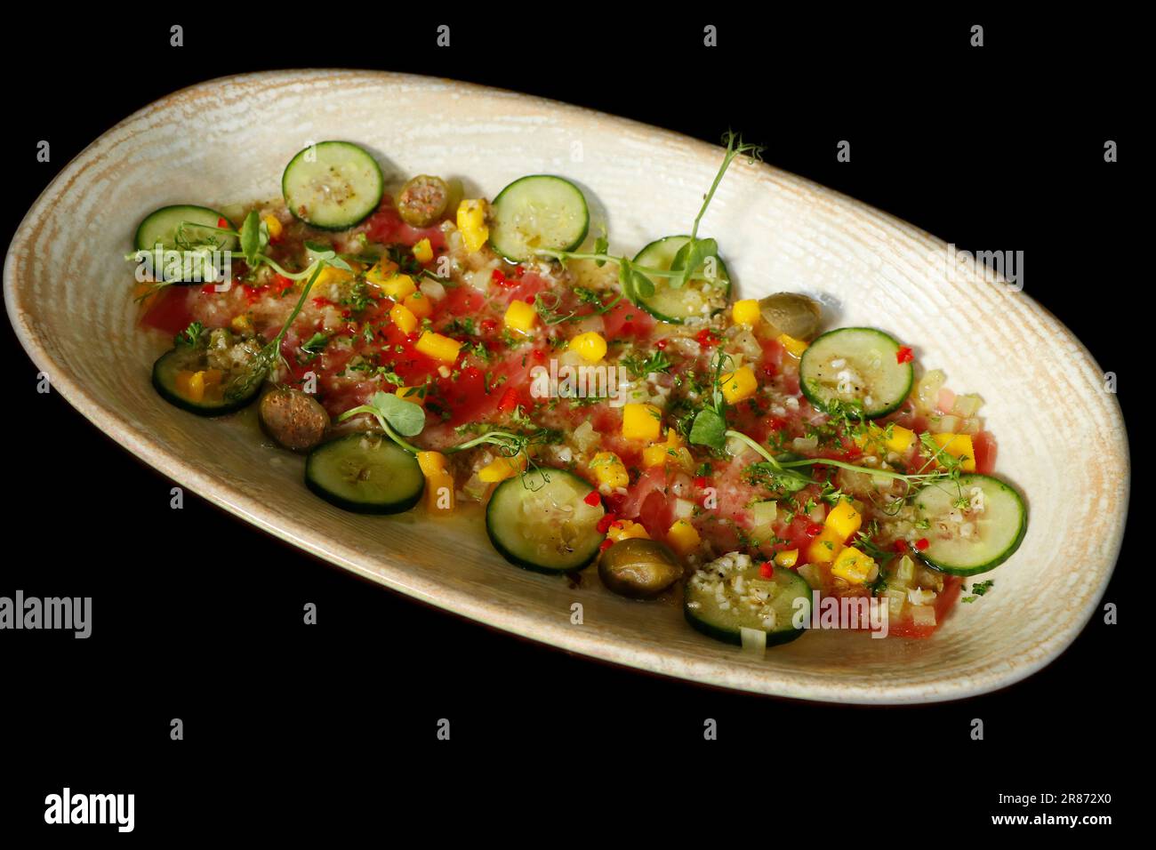 marinated yellowfin tuna crudo, similar to ceviche and tartare with